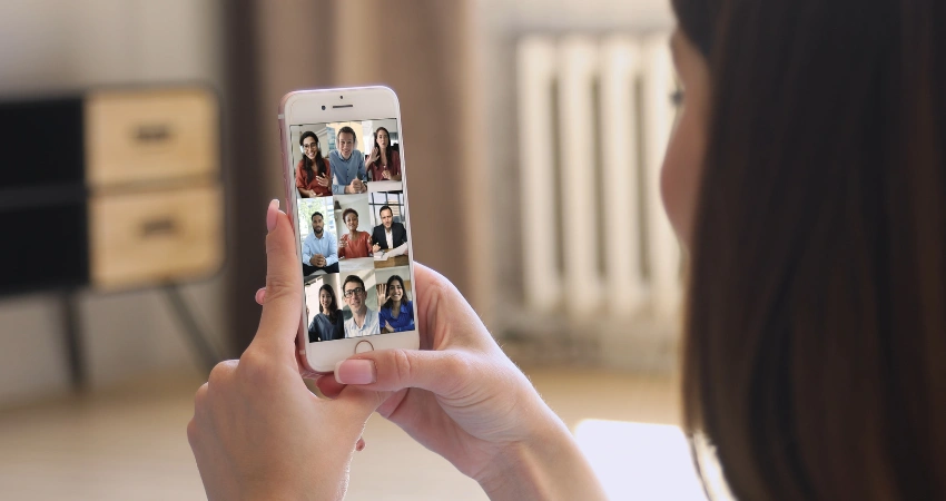Image of participants attending an online recovery support group meeting via video call