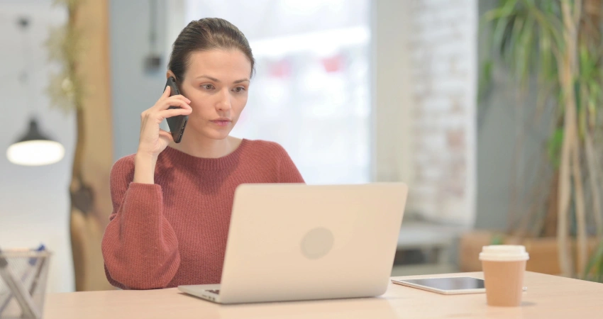 Image of a woman making a confidential call to Shanti Recovery and Wellness to begin her personalized IOP journey
