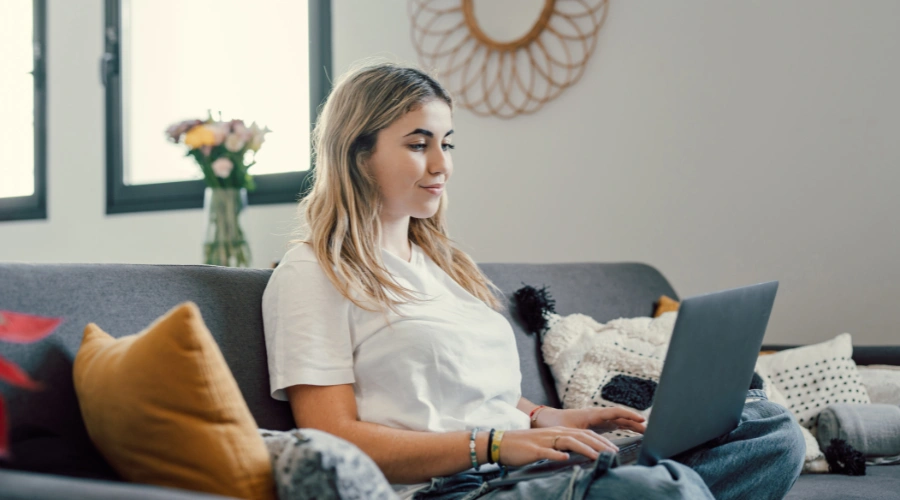 Image of a woman on a video call with her therapist in a supportive, non-judgmental virtual IOP session after a relapse