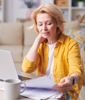 Image of a woman reviewing her investment in recovery through private pay luxury IOP treatment and personalized care