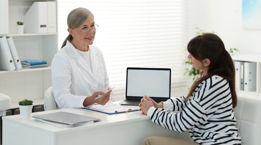 Image of a woman in a medical assessment to determine whether a higher level of care is needed beyond virtual IOP