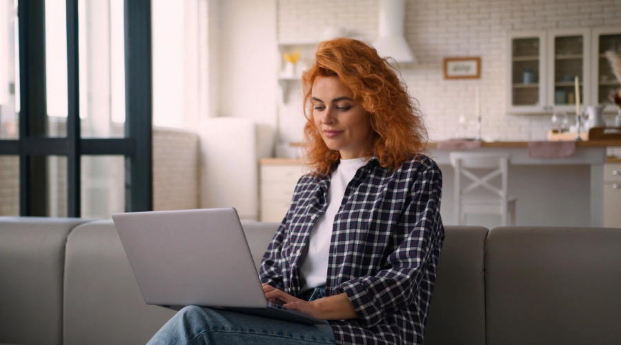 Image of a woman searching online for substance use treatment resources available in rural California county